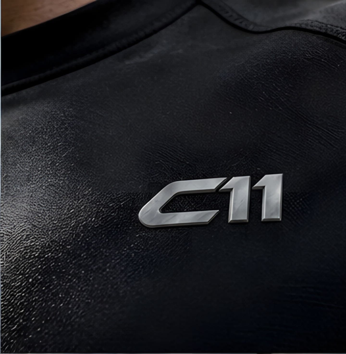 Embroidered C11 chest logo