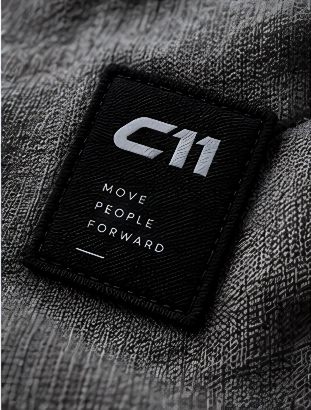 Woven C11 label on knit fabric