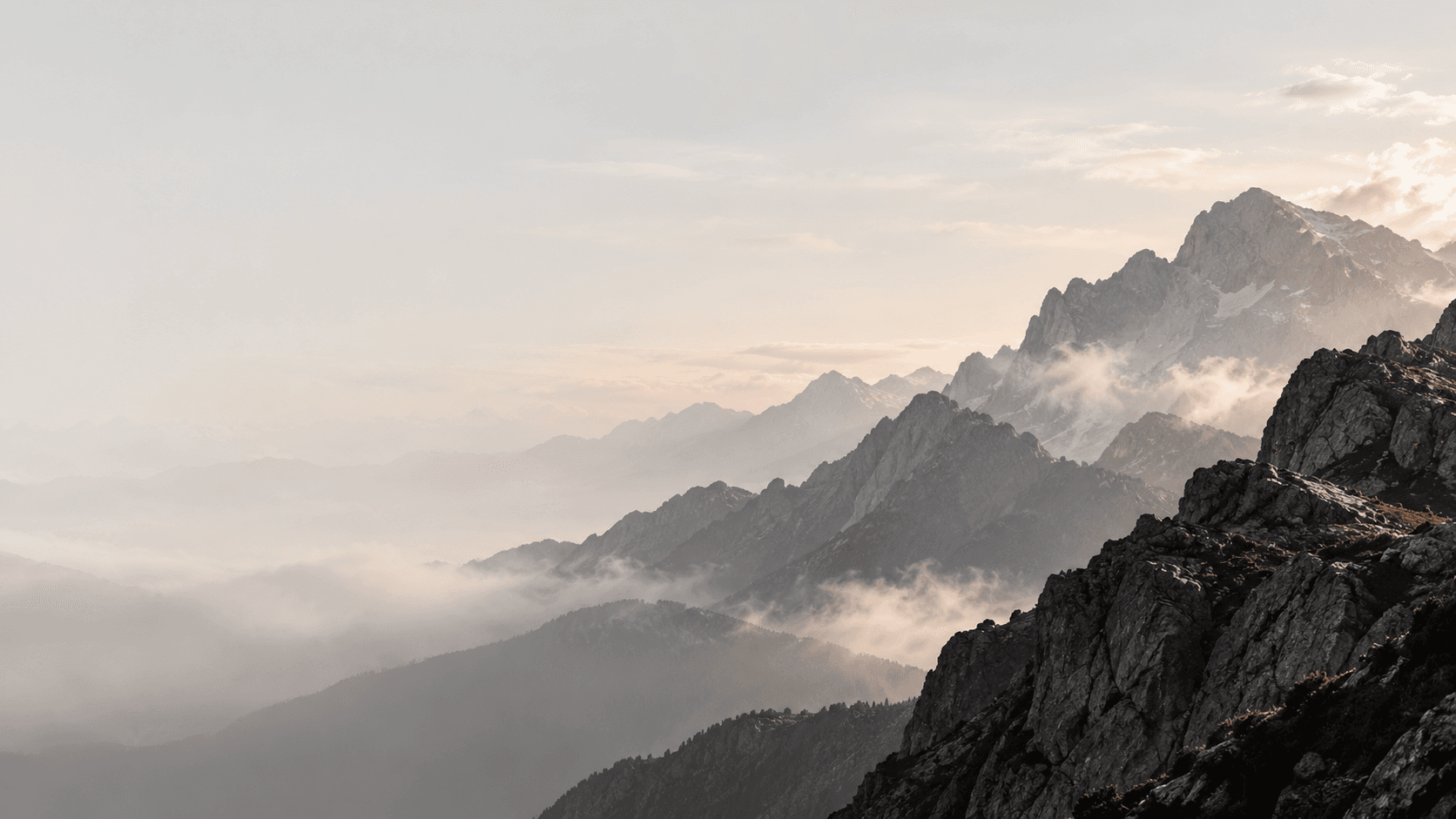 Athlete on a mountain ridge at first light